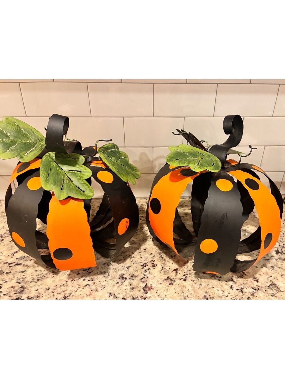 Pair of Decorative Metal Pumpkin Sculptures with Leaf Accents